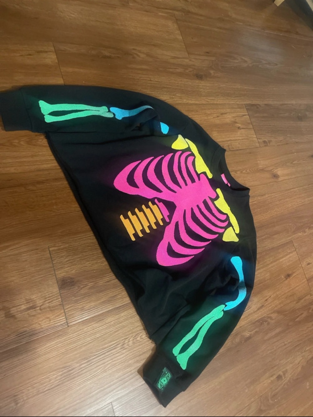QUEEN OF SPARKLES Black Sweatshirt with Neon Skeleton Print